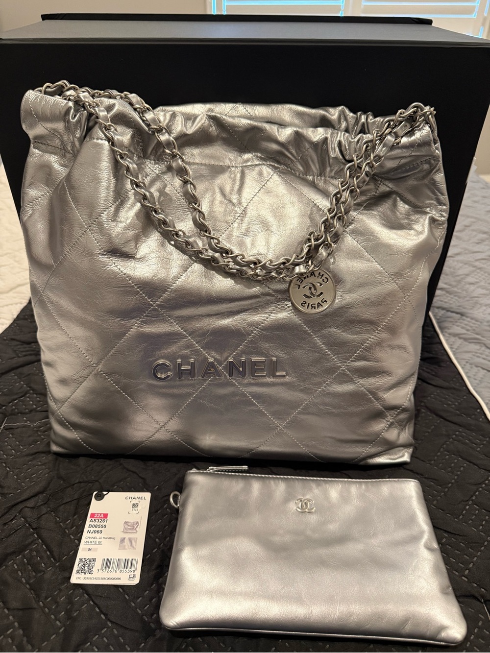 Chanel 22 in Metallic silver leather with silver hardware